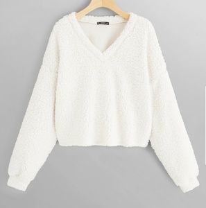 White v-neck fuzzy sweater
